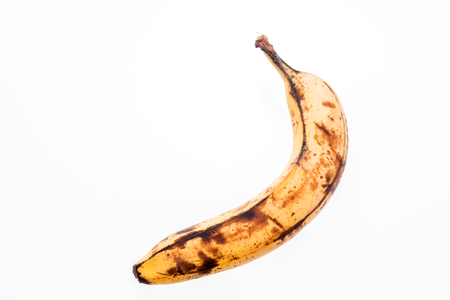 Rotten old banana isolated on white backgroundの写真素材