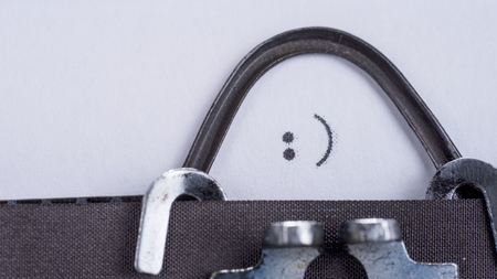 Smiley sign written on an old retro typewriterの写真素材
