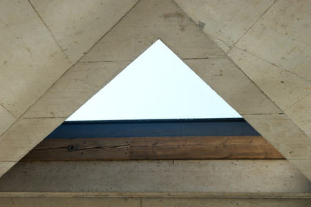 Empty triangle window in the modern interior