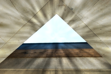 Empty triangle window in the modern interior