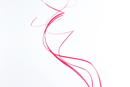 Red threads isolated and place for an inscriptionの写真素材