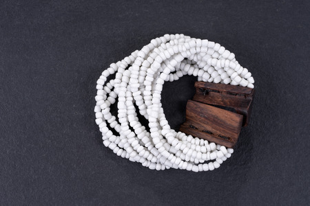 White pearl bracelet isolated on black backgroundの写真素材