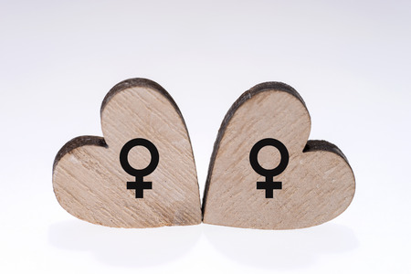Two wooden hearts, symbol of homosexual movementの写真素材