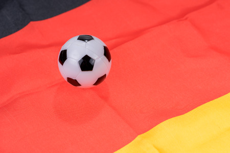 Football on Germany flag background. Football and Soccer Gamesの写真素材
