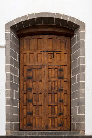 Old wooden door of a churchの写真素材