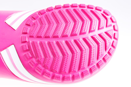 Profiles of pink rubber soles of summer shoes