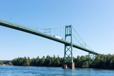 Detail of the Thousand Islands Bridge across the St. Lawrence River. This bridge connects New York State to USA and Ontario in Canadaの写真素材