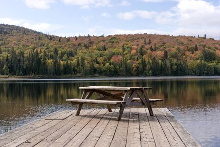 Resting place on the wooden pier at the lake at Mont Tremblant National Park. Quebec. canada