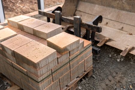 New paving slab on pallet, building materials for the reconstruction of the pavementの写真素材