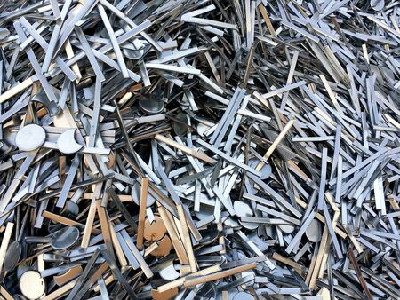 Steel scrap materials recycling. Abstract, background and texture of metal waste. Waste after...