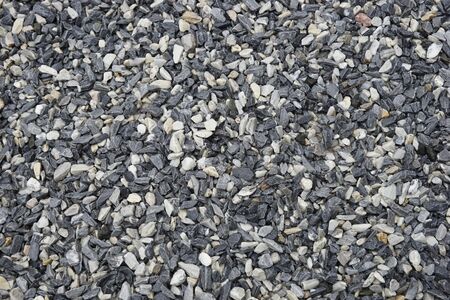 Decorative black and white pebble stones as background