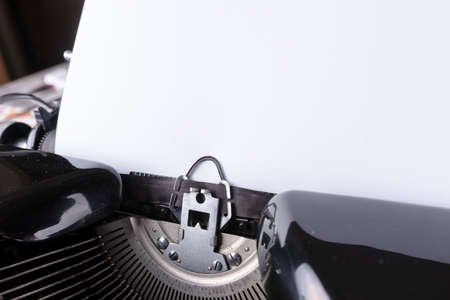 Vintage typewriter with empty paper sheet. Place for copy space for your textの写真素材
