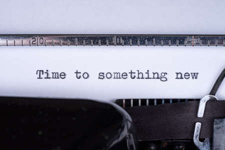 Time to something new - written on a vintage typewriterの写真素材