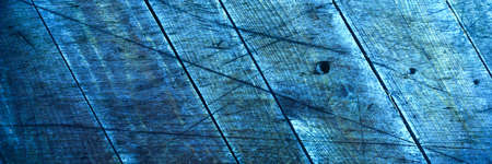 Blue wood vintage panoramic background. Top view of wooden background with cracks