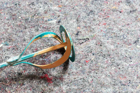 Closeup spiral paddle mixer for mixing of mortar, paint, plaster and powderの写真素材