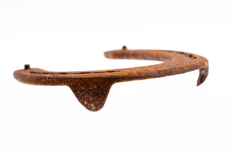 Rusty horseshoe isolated on white background. Good luck symbolの写真素材