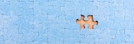 Puzzle with one missing piece. Panoramic image. Problem solving conceptの写真素材