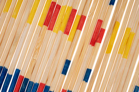 Closeup of a colorful mikado game. Wooden mikado game sticks as a backgroundの写真素材
