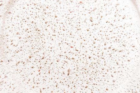 Abstract background. Uneven bright background with dotsの写真素材