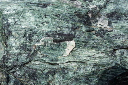 Close-up of natural green granite stone as backgroundの写真素材