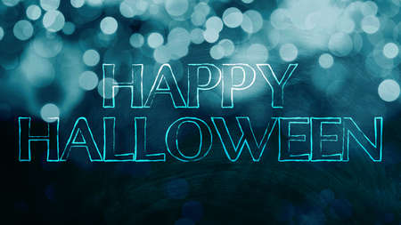 Happy Halloween. Text on blue blurred background. Trick or treatの写真素材