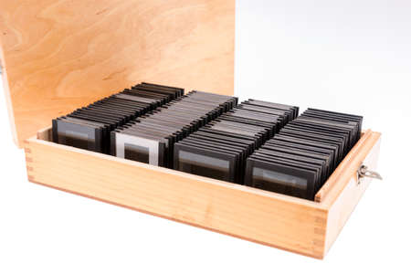 Old slides in a wooden box