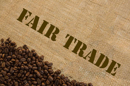 Dark roasted fair trade coffee beans with text Fair Tradeの写真素材