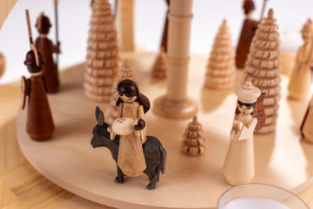Detail of typical wooden Christmas pyramid with wooden treesの写真素材