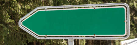 Empty green information sign on the street for your text. Panoramic imageの写真素材