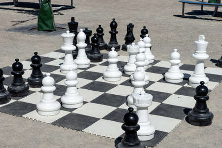 Outdoor large chess. Chess pieces. Outdoor entertainment and gamesの写真素材