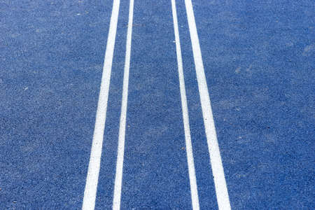 Top view blue field rubber ground with white lines outdoorsの写真素材