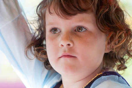 Close up Portrait of young girl outsideの写真素材