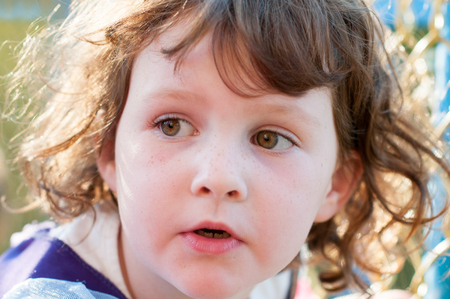 Close up Portrait of young girl outsideの写真素材