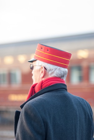 STRASBURG, PA - DECEMBER 15: Conductor standing watching Steam Locomotive in Strasburg, Pennsylvania on December 15, 2012のeditorial素材
