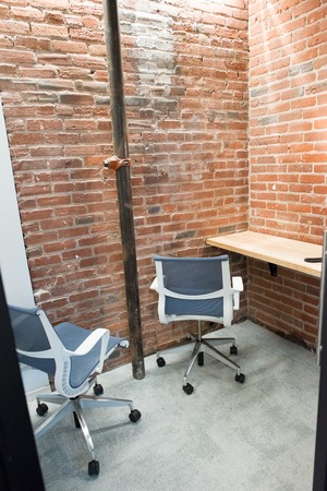 Trendy modern open concept loft office space with big windows, natural light and a layout to...