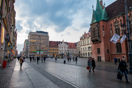 Wroclaw, Poland - March 8, 2018: Wroclaw Market Square in evening after rain storm in historic capital of Silesia, Poland, Europe.のeditorial素材