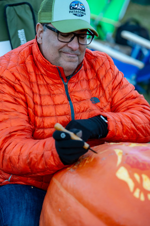 CHADDS FORD, PA - OCTOBER 18: Person carving pumpkin at The Great Pumpkin Carve carving contest on October 18, 2018のeditorial素材