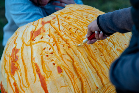 CHADDS FORD, PA - OCTOBER 18: View Person carving pumpkin at The Great Pumpkin Carve carving contest on October 18, 2018のeditorial素材