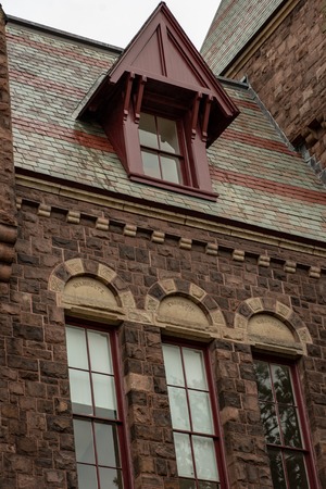Buildings at Cornell University during peak fall time with autumn colors in Ithaca, New York