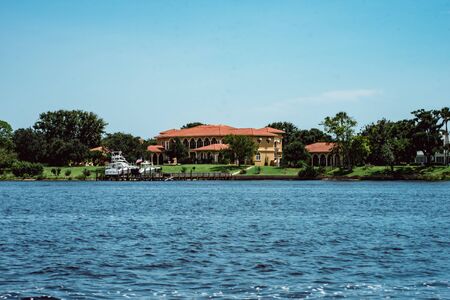 Daytona Beach, FL - August 14, 2018: View of large private homes along the bay