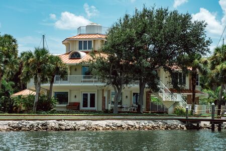 Daytona Beach, FL - August 14, 2018: View of large private homes along the bay