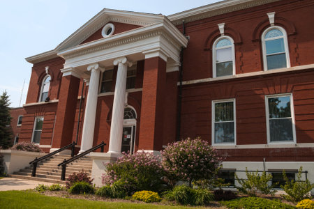 Green Lake, Wisconsin, USA June 3 2011: the former County of Green Lake Courthouse building transformed into the Green Lake Town Square Community Center in 2012. There are many programs and events held here for the community.のeditorial素材