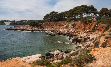 Rugged mediterranean coastline with emerald green water and rocky shore in Cassis, Franceの写真素材