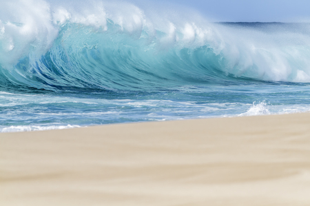 Breaking Ocean wave on the beach in Hawaiiの写真素材