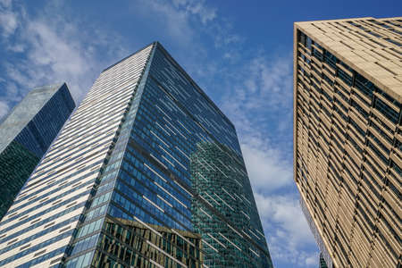 Skyscrapers in the business center, financial district, sunny day, blue sky, empty space, Moscow...