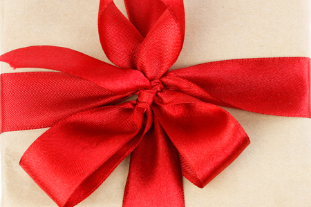 Red ribbon on gift box closeupの写真素材