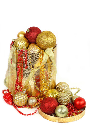 Box with Christmas decorations on white backgroundの写真素材