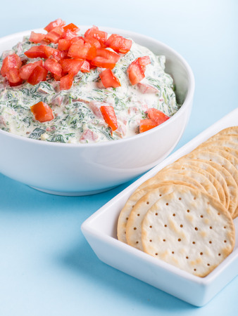 Spinach dip with crackersの写真素材