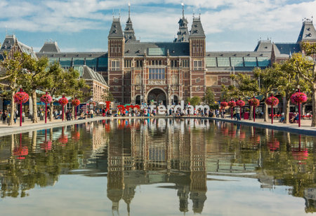 September 14, 2014. Amsterdam, Netherlands. The reflecting pool in front of the Rijksmuseum is a bustling tourist locationのeditorial素材