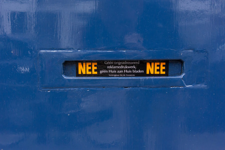 Instructions inform postal workers not to leave unaddressed mail or junk mailの写真素材